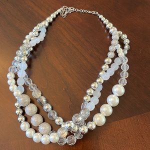 Pearl and silver intertwined necklace